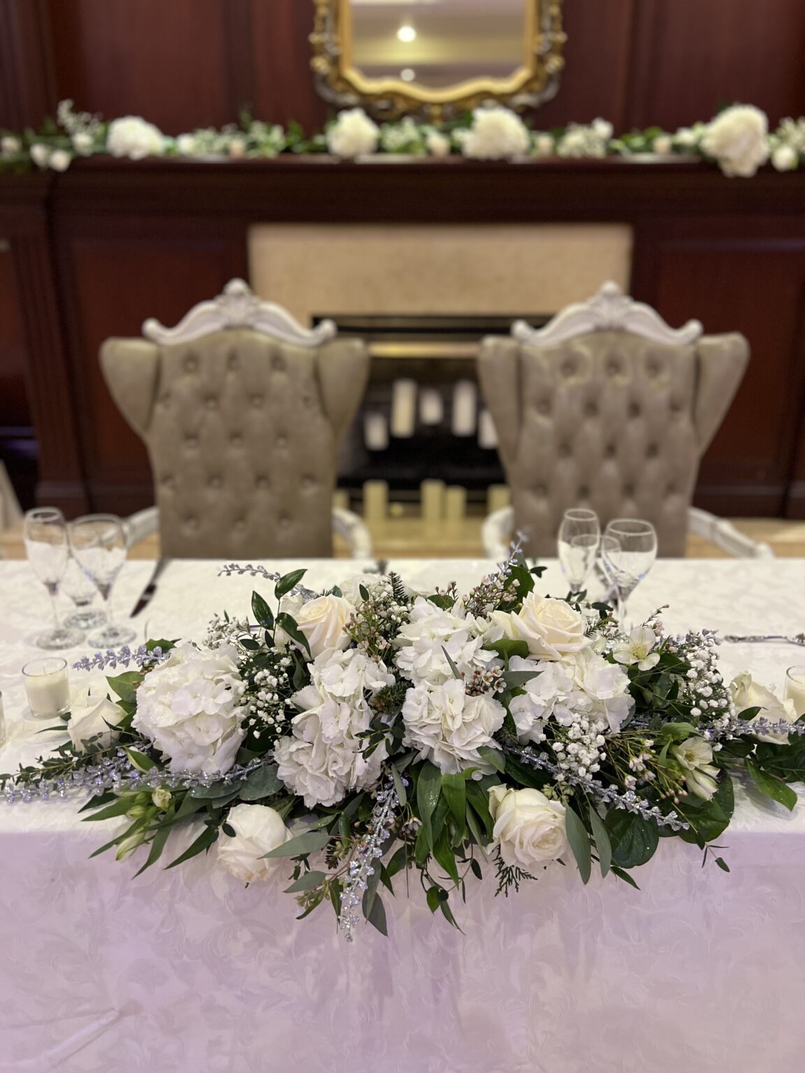 bride and groom table arrangement